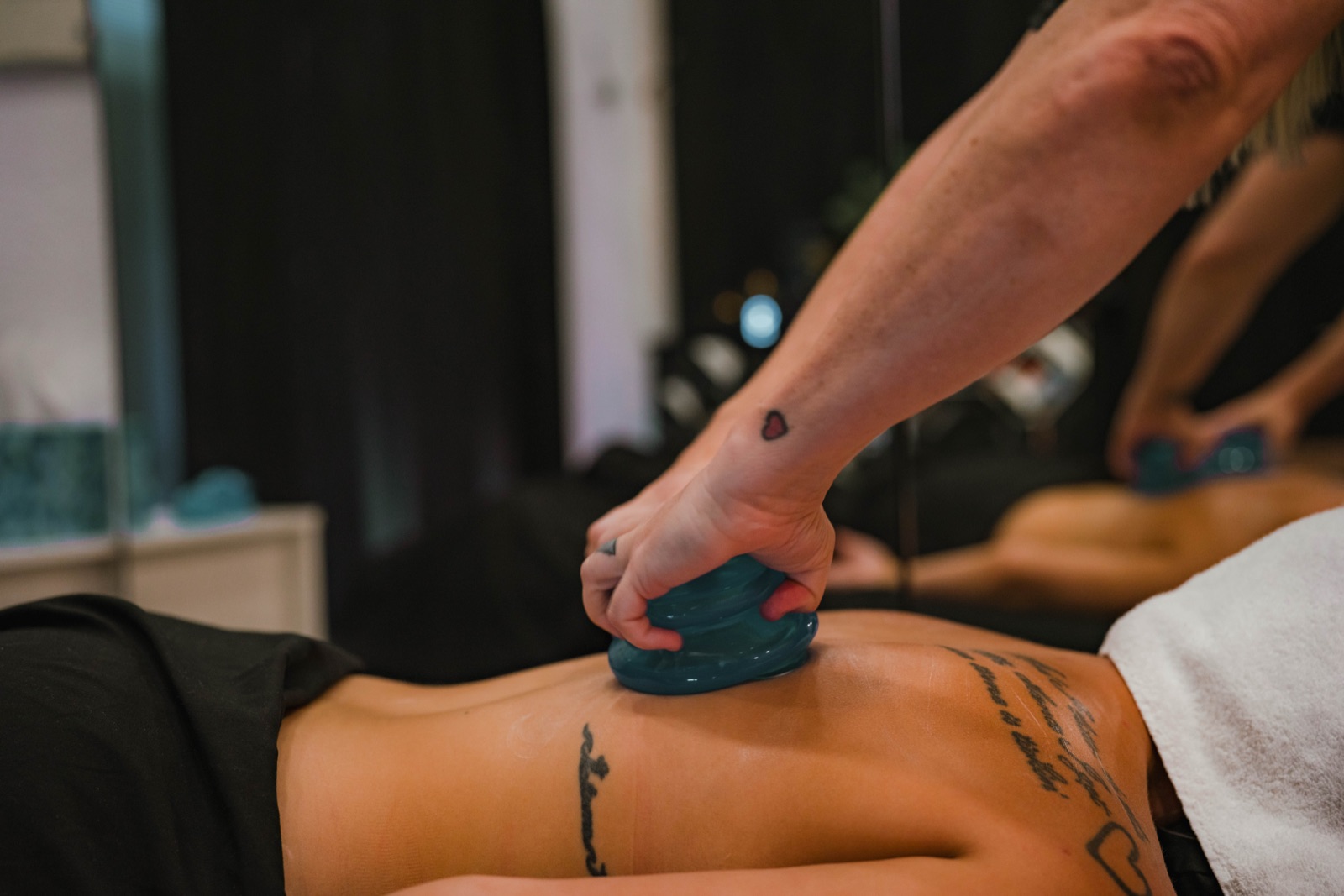 Cupping therapy on a client's back at Flex Fitness